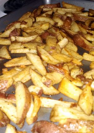 A picture of Seasoned baked French fries.