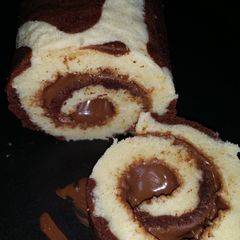 A picture of Giraffe pattern roulade with nutella filling..
