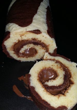 A picture of Giraffe pattern roulade with nutella filling..