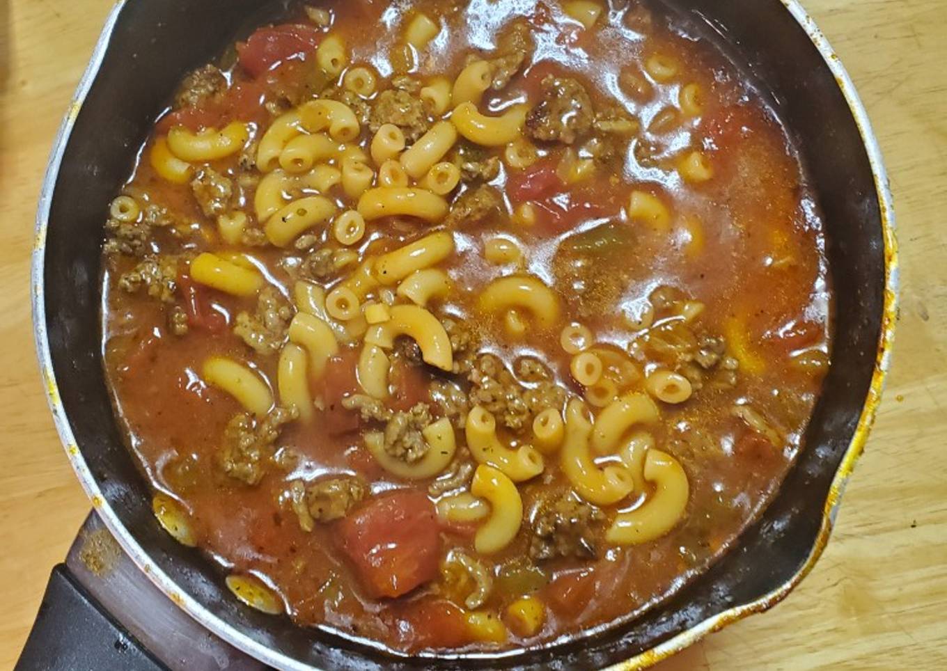 Noodle soup with beef and tomatoes