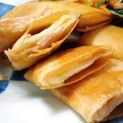 A picture of Cured Ham and Cheese Spring Rolls.