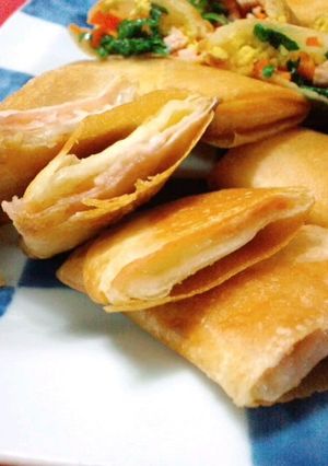 A picture of Cured Ham and Cheese Spring Rolls.