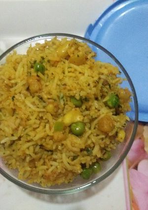 A picture of Tomato gatta peas pulav.