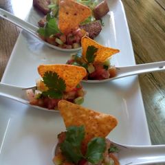 A picture of Salsa with nachos.