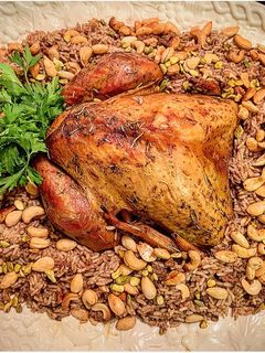 صورة لوصفة دجاج محشي بالأرز والمكسرات