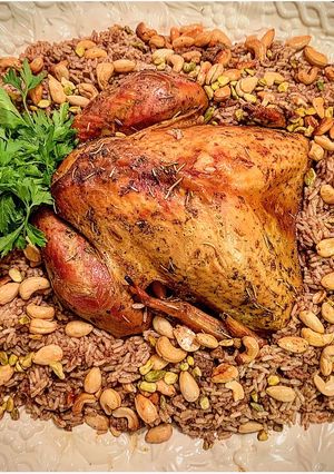 صورة لوصفة دجاج محشي بالأرز والمكسرات