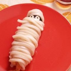 A picture of Cheesy Prawn Tempura Mummy Wrapped in Udon Noodles.