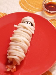 A picture of Cheesy Prawn Tempura Mummy Wrapped in Udon Noodles.