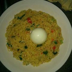Vegetable Indomie and boiled egg A picture of Vegetable Indomie and boiled egg.