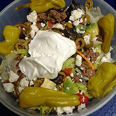 A picture of Salad with ground meat.