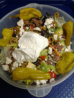 A picture of Salad with ground meat.