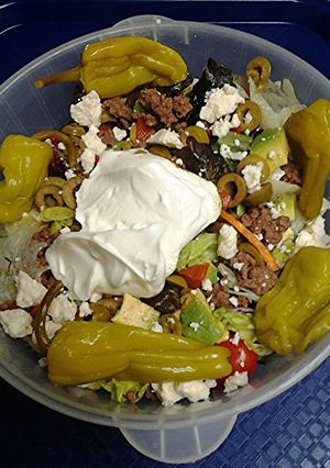 A picture of Salad with ground meat.
