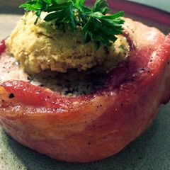 A picture of Bacon wrapped pork w/dijon butter.