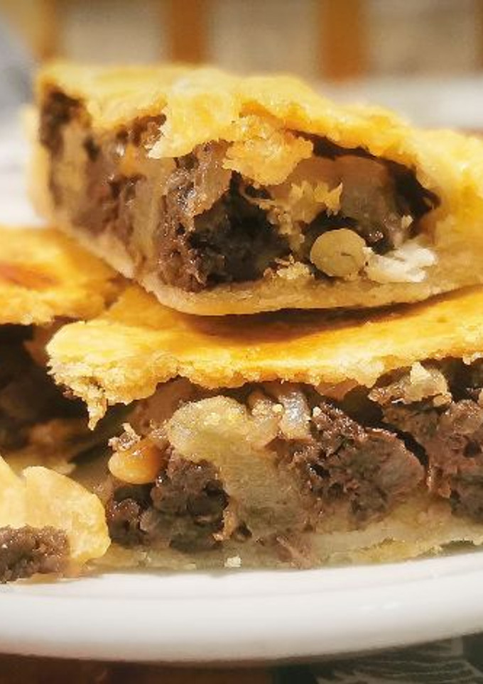 Una foto de Empanada de Morcilla y Manzana