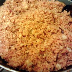 A picture of Cous cous with red pesto.