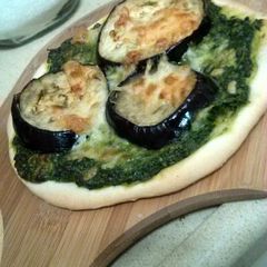 A picture of eggplant pesto pizza.