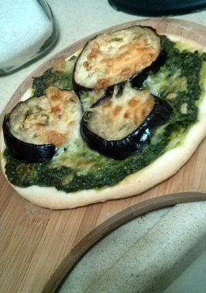 A picture of eggplant pesto pizza.