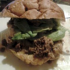 A picture of loose meat sandwiches.