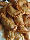 Empanaditas de carne de buey y chalotas al comino