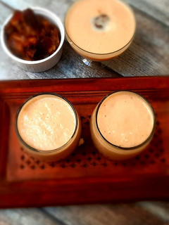 A picture of Dates and chiku shake (no sugar).