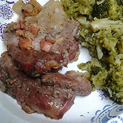 A picture of Roasted pork with banana guava ketchup.