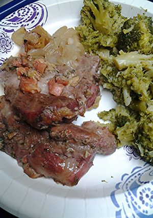 A picture of Roasted pork with banana guava ketchup.