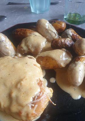 A picture of Chicken with Vin Jaune and Comté Gratin.