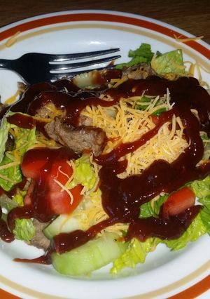 A picture of BBQ STEAK SALAD.