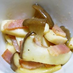 A picture of King Oyster Mushroom and Bacon in Butter and Soy Sauce.