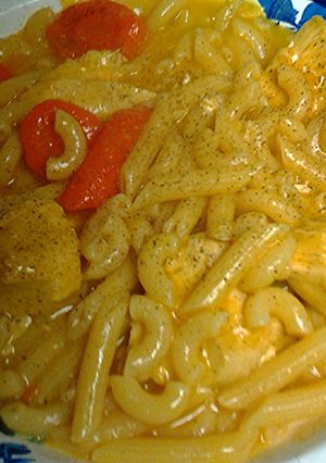 A picture of pasta chicken and carrots.