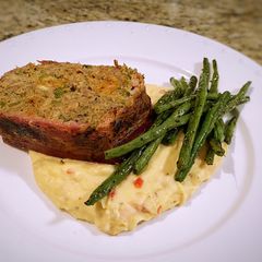 Hatch Chile and cheese bacon wrapped Meatloaf A picture of Hatch Chile and cheese bacon wrapped Meatloaf.