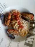 Cozze ripiene al sugo di pomodoro