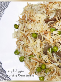 صورة لوصفة أرز بالشعيرية واللحم على طريقة أم أمينة