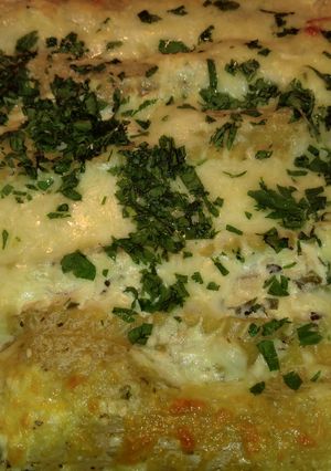A picture of Spinach & artichoke chicken lasagna.