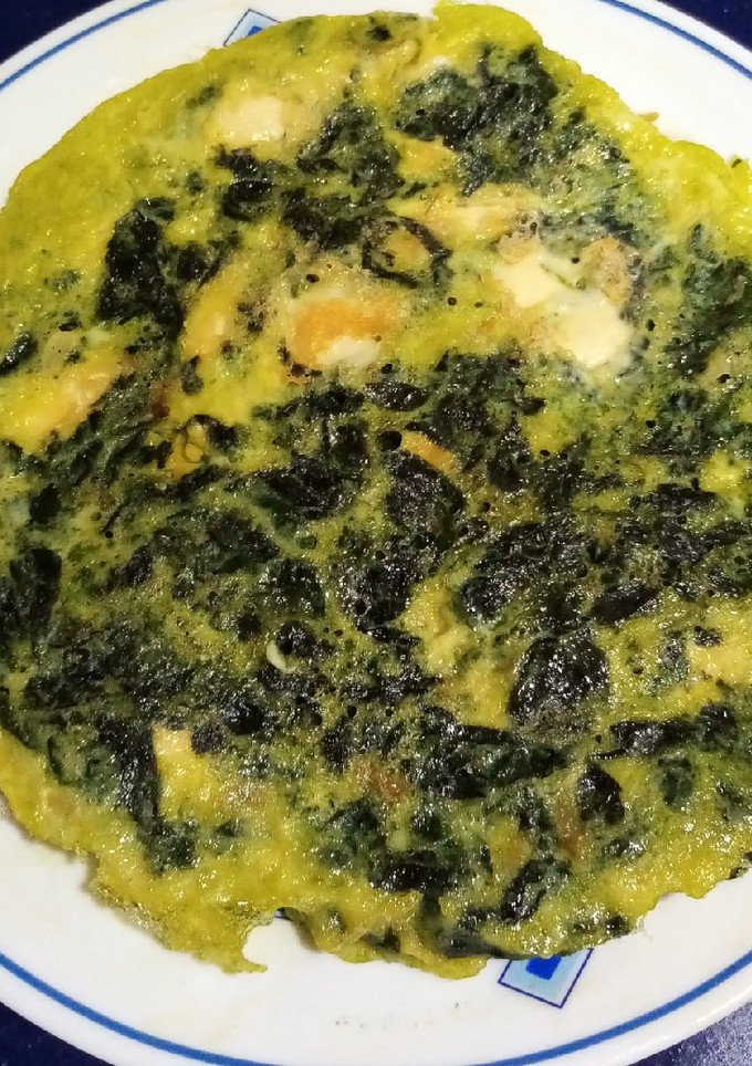 Una foto de Tortilla de espinacas al ajillo con queso