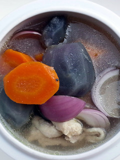 A picture of Black Potato In Chicken Soup.