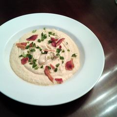 A picture of Creamed Cauliflower with cheese bacon and chives.