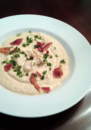 A picture of Creamed Cauliflower with cheese bacon and chives.