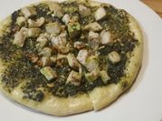 A picture of chicken pesto pizza