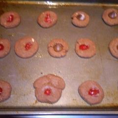 A picture of Hershey kiss chocolate Blossom cookies.