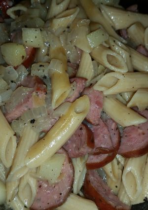 A picture of Kielbasa, onion, and apples oh my!.