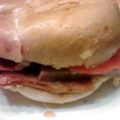 A picture of Hot Ham & Cheese Sandwiches .. for a Party.