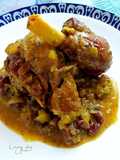Pata de cordero en salsa de especias con pasas