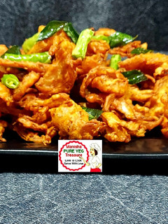 A picture of Crispy Kanda Bhajji - Crispy Onion Pakoda.