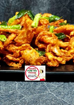A picture of Crispy Kanda Bhajji - Crispy Onion Pakoda.