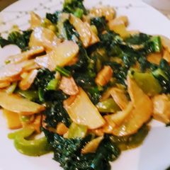 Stir-fried potatoes & greens A picture of Stir-fried potatoes & greens.