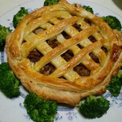 A picture of Meat Pie with Mozzarella Cheese.