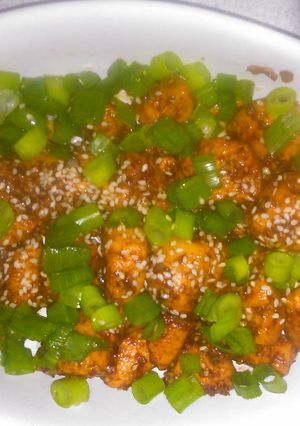 A picture of Soy sauce. Garlic chicken.