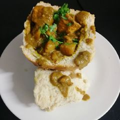 A picture of Chicken Bunny Chow.