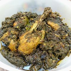 A picture of Achari palak chicken.